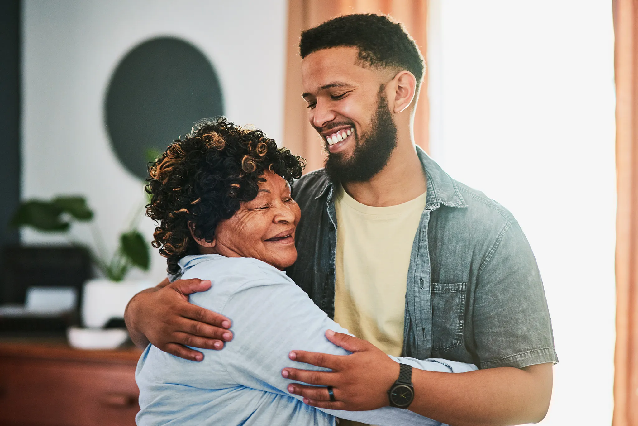 two people hugging each other
